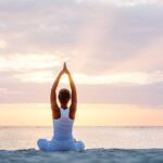 Relax and do yoga on the beach in Camber Sands