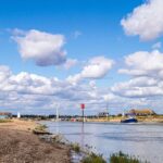 Listen to the boats clinking on the calm waters of Rye Harbour